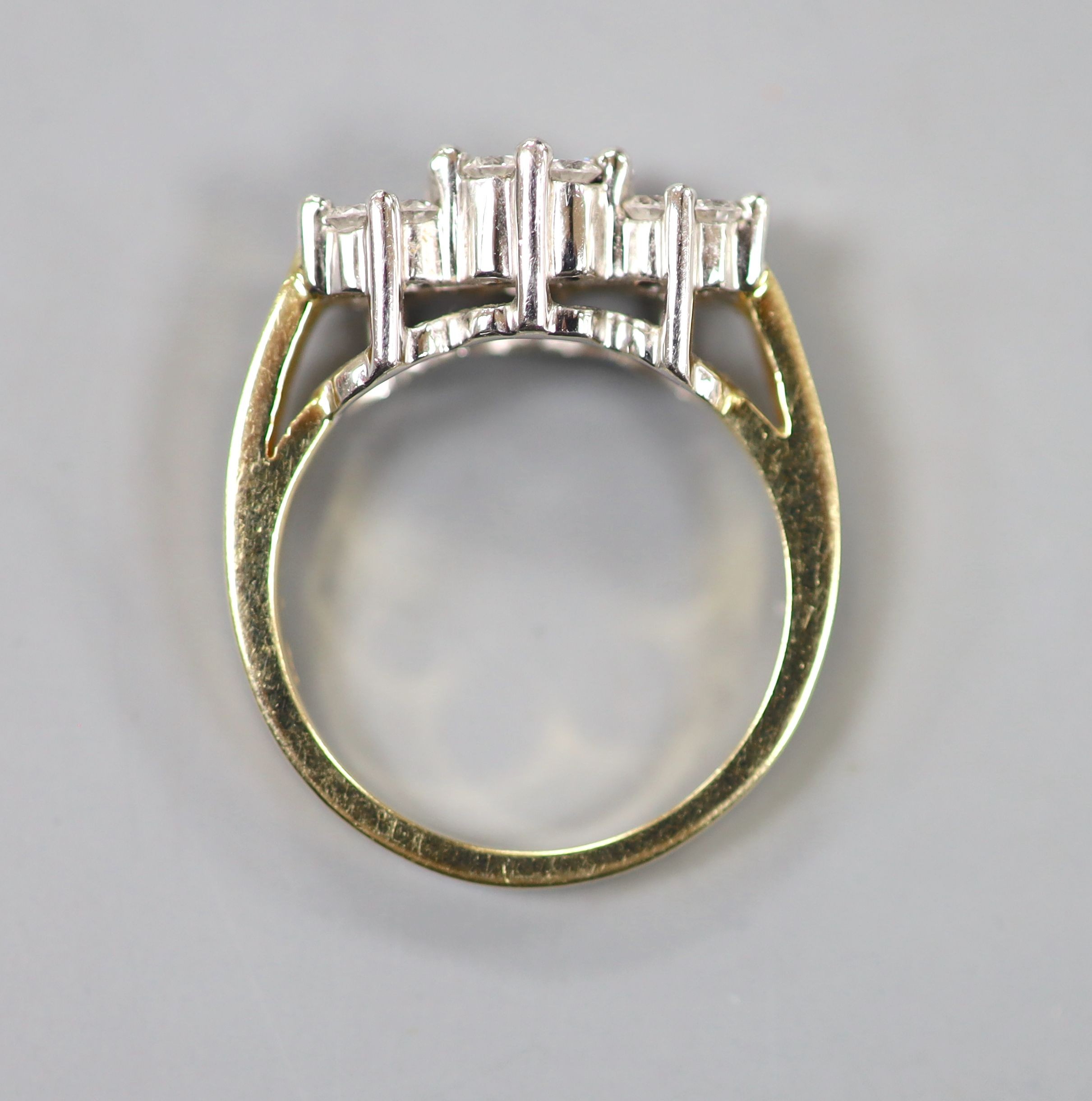 A modern 14k and diamond set triple cluster ring, size O, gross weight 6.3 grams.